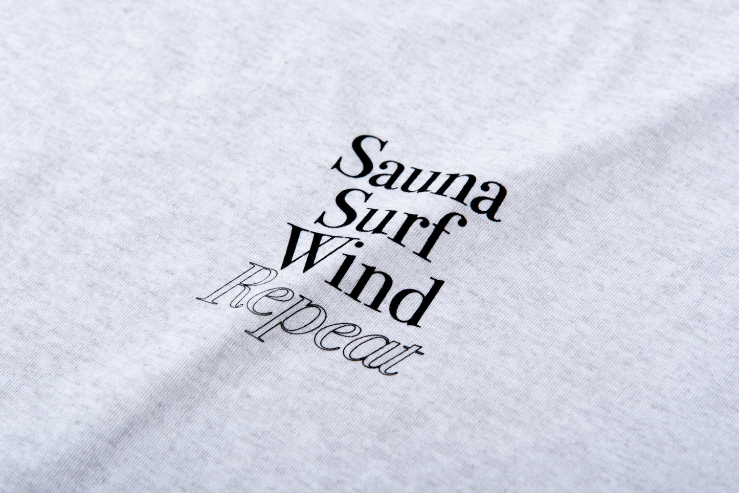 No-Sleeve Tee”Sauna Surf Wind Repeat”